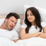 Depositphotos 74747905 stock photo woman looking at man snoring.webp.webp