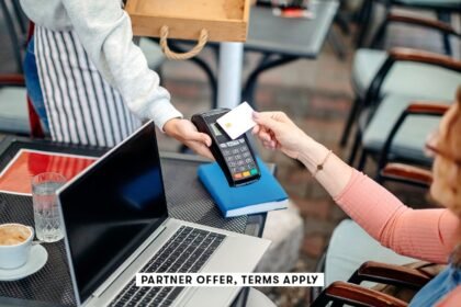 20250715 social disclaimer parter offer terms apply waitress holding credt card reader for customer.jpeg