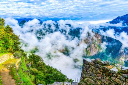 Clouds floating above the rainforest below the trail 6881637052590725954104 scaled.jpg
