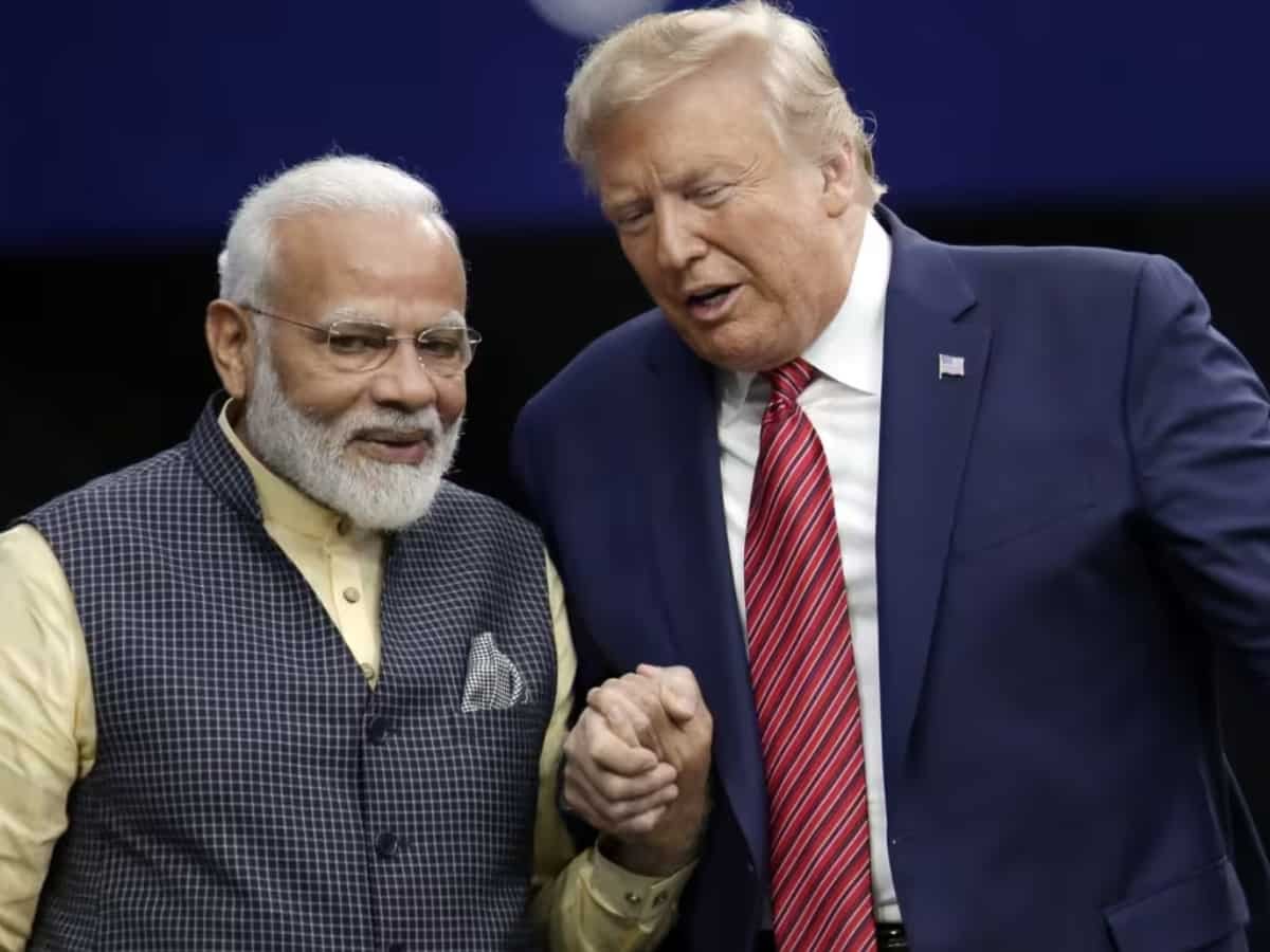 388217 pm modi with trump ap.png
