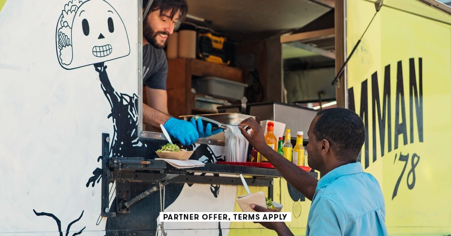 Social image partner offer terms apply man paying his order in a food truck martinedoucet 8.jpg