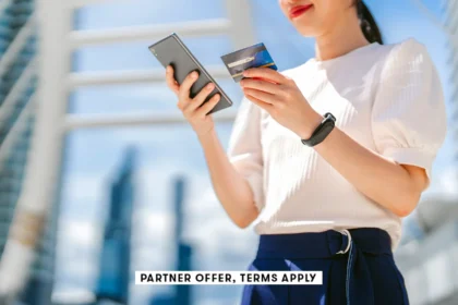 20250715 social disclaimer parter offer terms apply person using credit card while on smart phone wi.webp