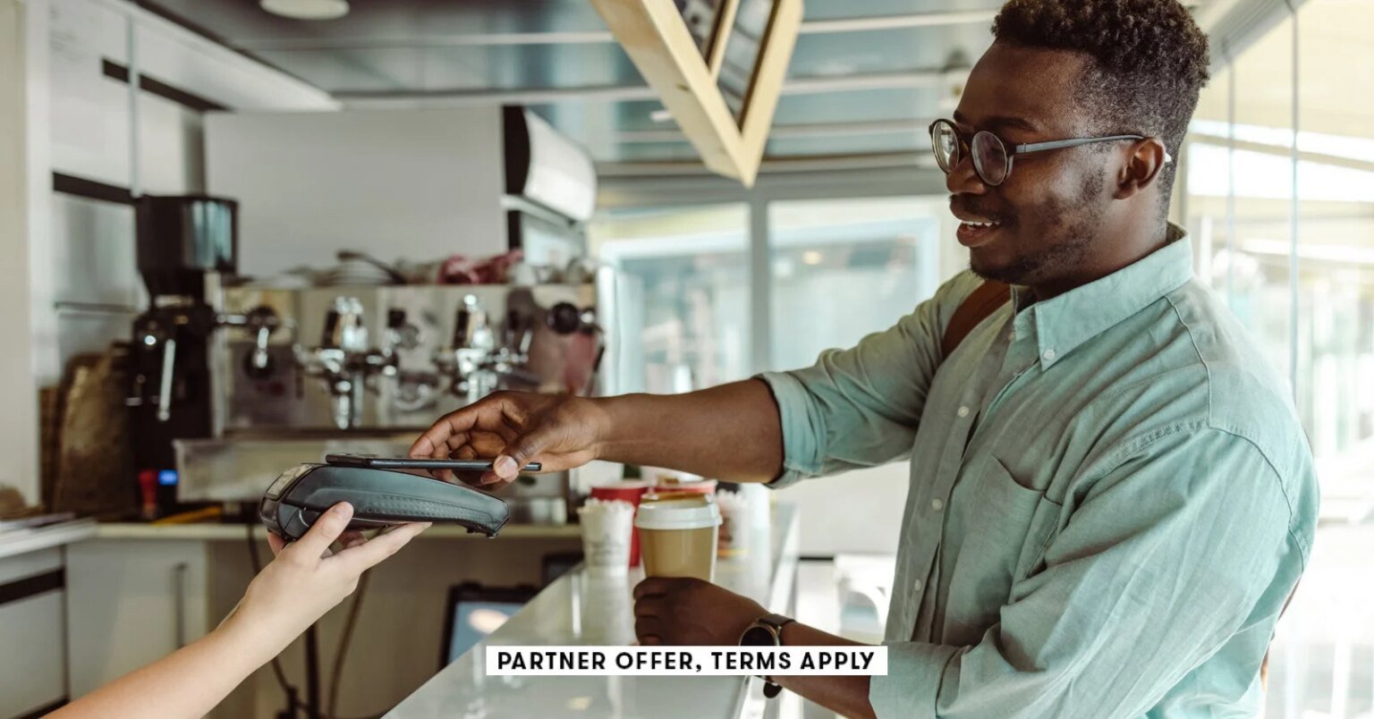 Social image partner offer terms apply young man paying for coffee milko 20.jpg