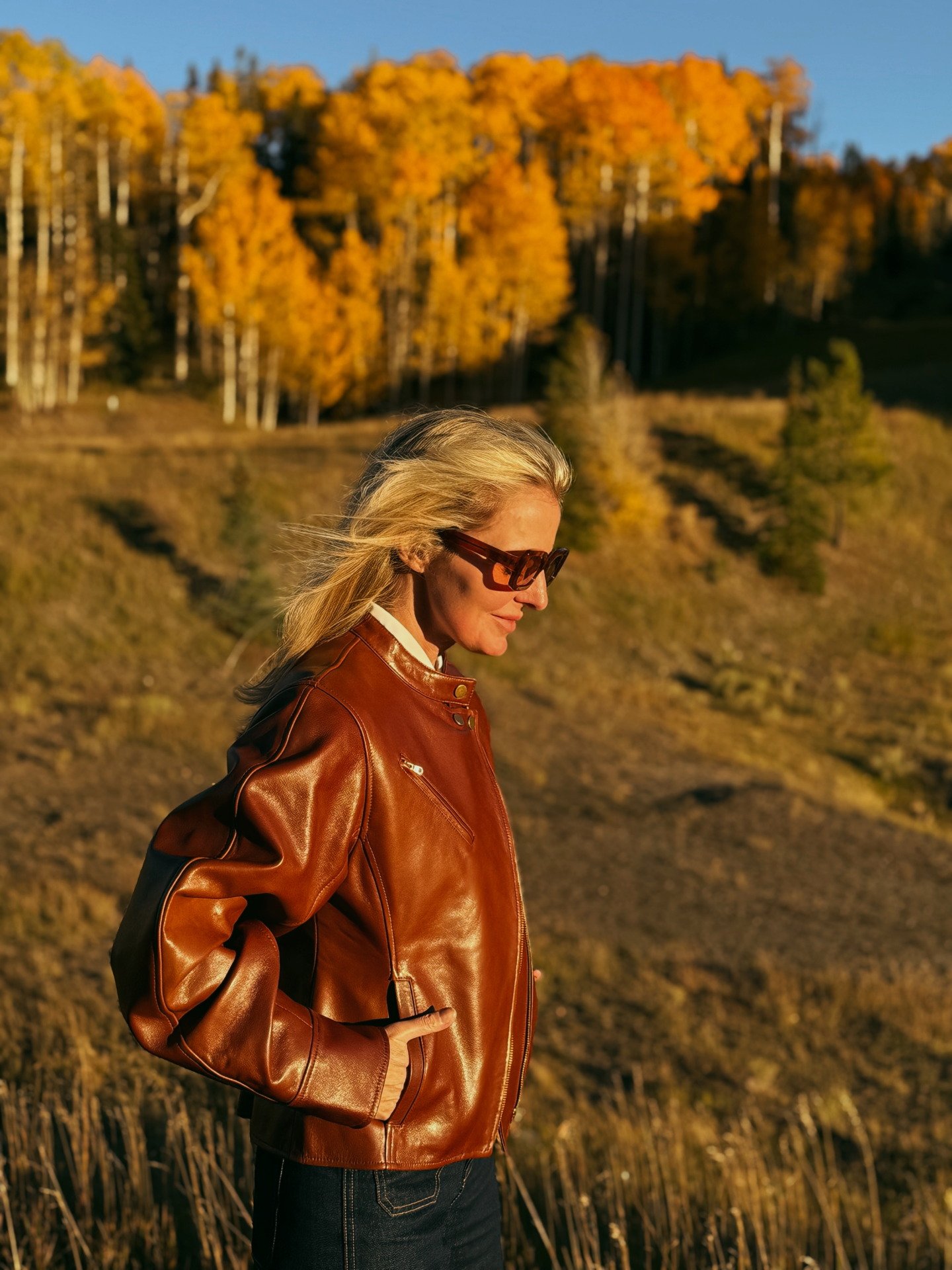 Ulla johnson brown leather jacket with veronica beard taylor wide leg jeans and white hevron button.jpeg