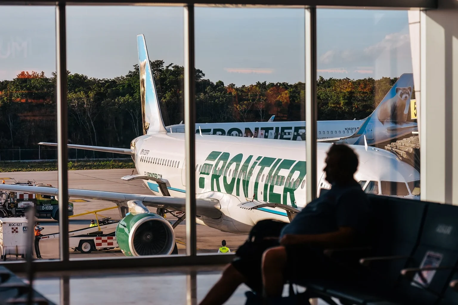 Frontier Airlines plane seen at Cancun International Airport Artur WidakNurPhoto via Getty Images.jp .webp