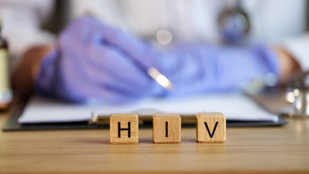 Hiv text cubes medical clinic against background doctor human immunodeficiency virus 1024x576.jpg