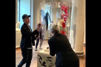 Protesters paint sculpture.jpg