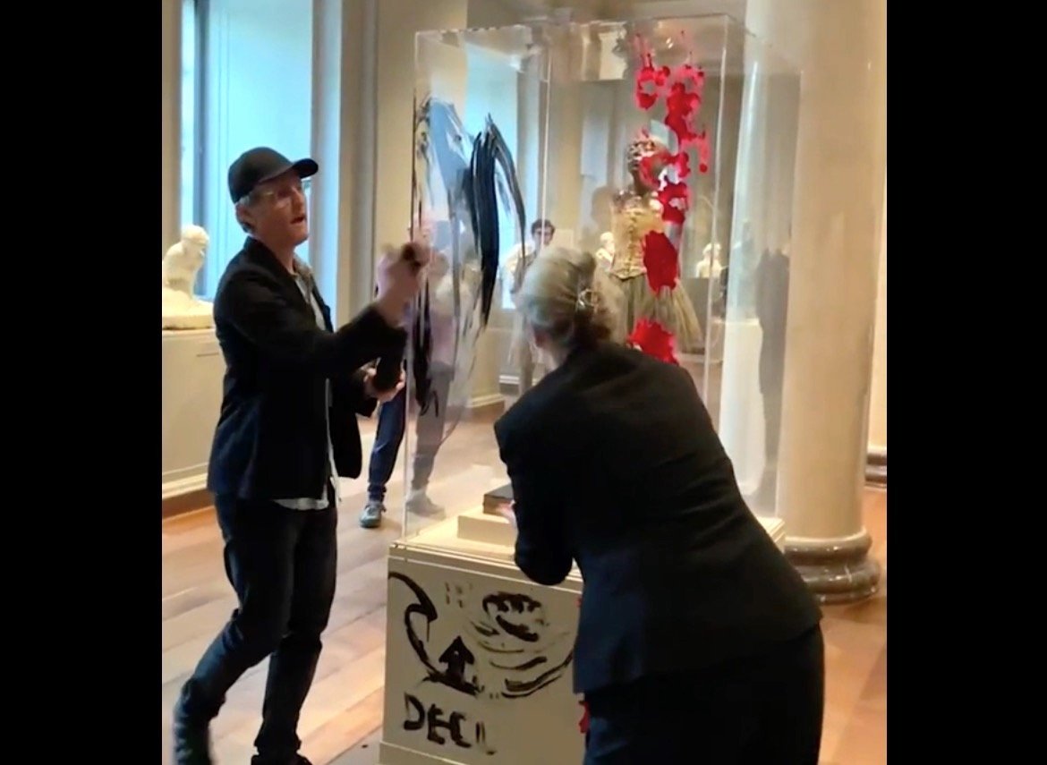 Protesters paint sculpture.jpg