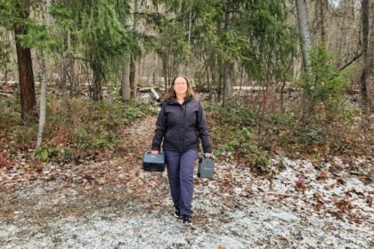 Bluetti Elite 30 V2 solar panel and BLUETTI SORA 60 Solar Panel woman walking through forest.jpg