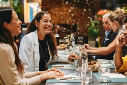 People at restaurant table getty.jpg