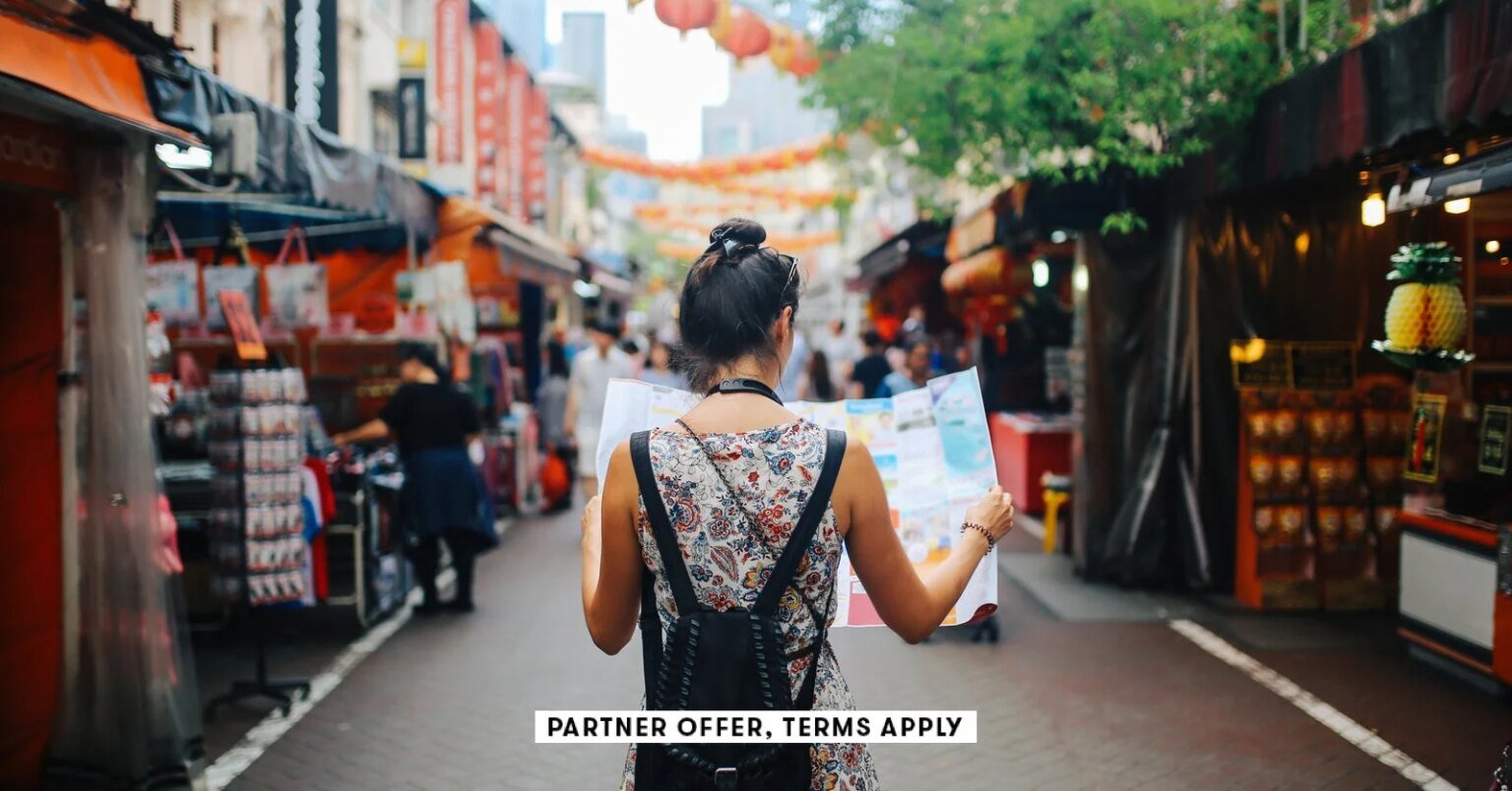 SOCIAL IMAGE PARTNER OFFER TERMS APPLY Solo traveler checking map lechatnoir 9.jpg