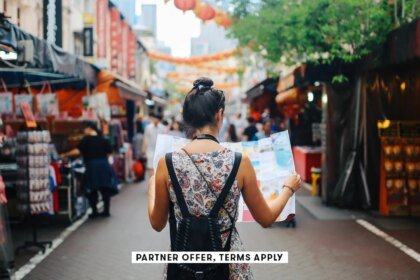 SOCIAL IMAGE PARTNER OFFER TERMS APPLY Solo traveler checking map lechatnoir 9.jpg