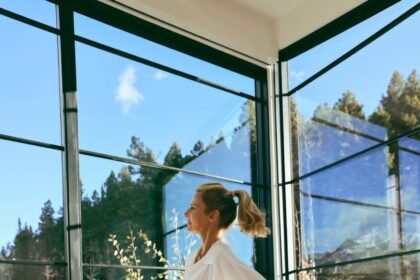 Black norma kamali sheer skirt with built in black bodysuit white top and toteme wedge black shoes 1.jpeg