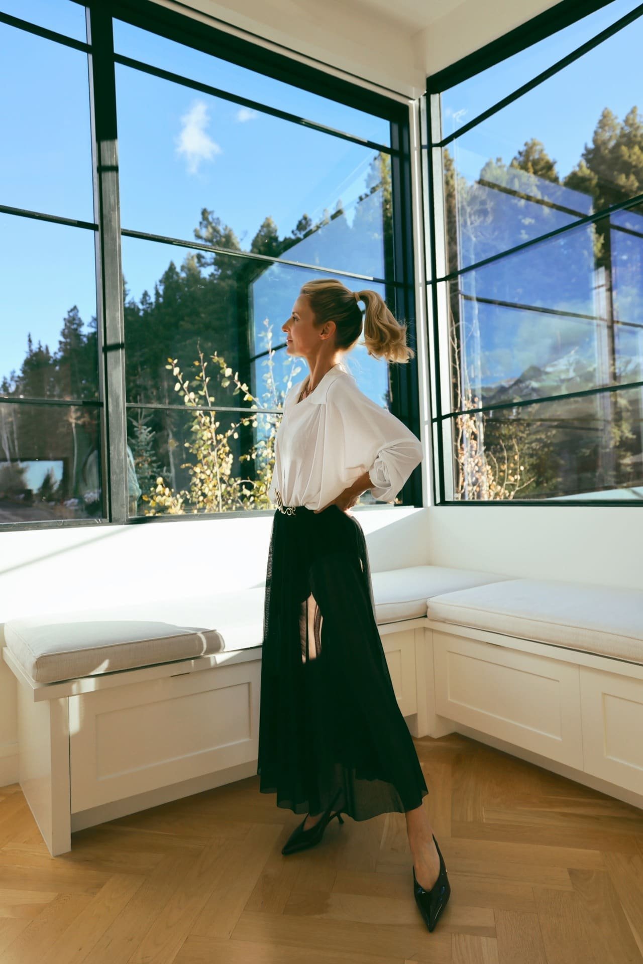 Black norma kamali sheer skirt with built in black bodysuit white top and toteme wedge black shoes 1.jpeg