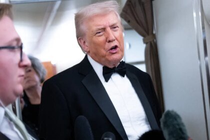 Donald trump speaks to members of the media.jpg