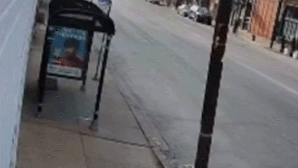 Delivery robot smashes into glass on sidewalk.gif