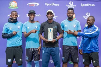 AFC Leopards Boss Fred Ambani displays his SportPesa League Coach of the Month award for March flank.jpeg