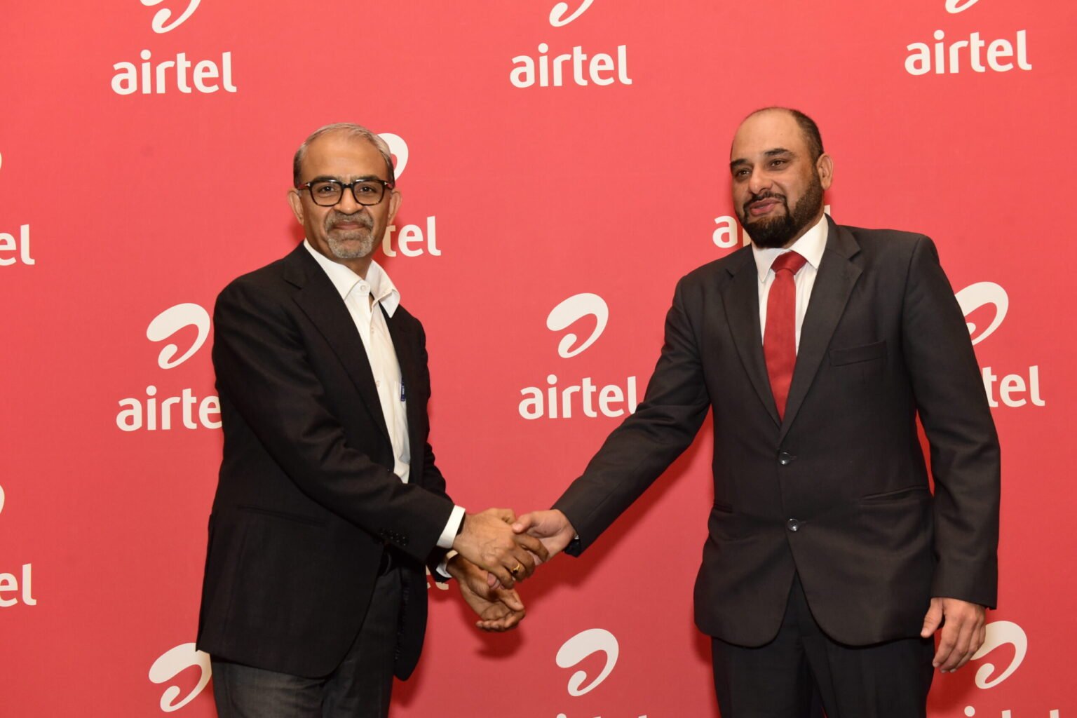 Airtel Africa Group CEO Sunil Taldar L Airtel Kenya MD Ashish Malhotra R scaled.jpg