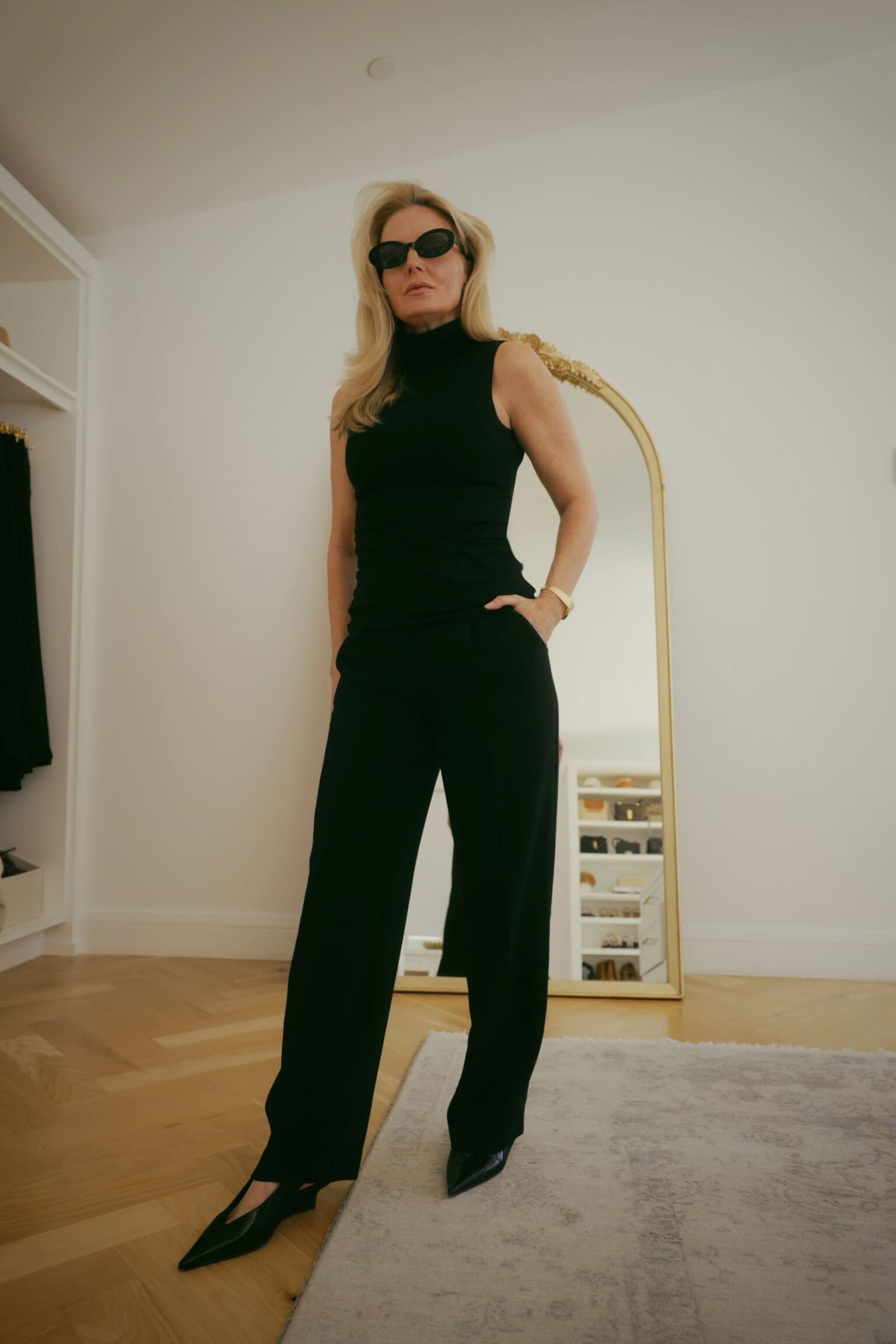 Black sleeveless turtleneck with black trousers by Aritzia 1 scaled.jpg